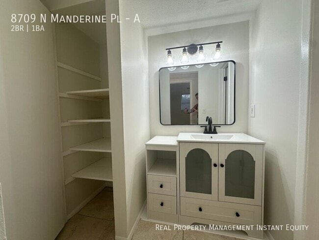 Building Photo - 8709 N Mandarine Pl