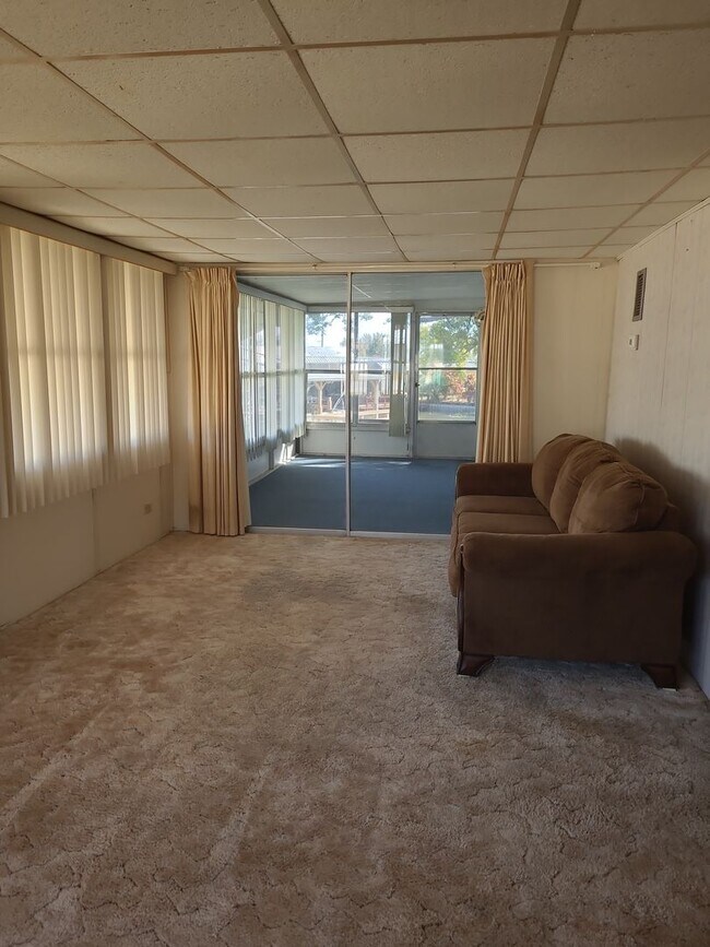 Building Photo - 55+ mobile home community. On canal to bea...