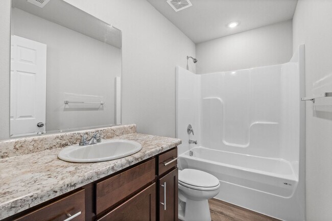 Building Photo - Charming Curb Appeal Meets Modern Comfort in the Monaco Plan!