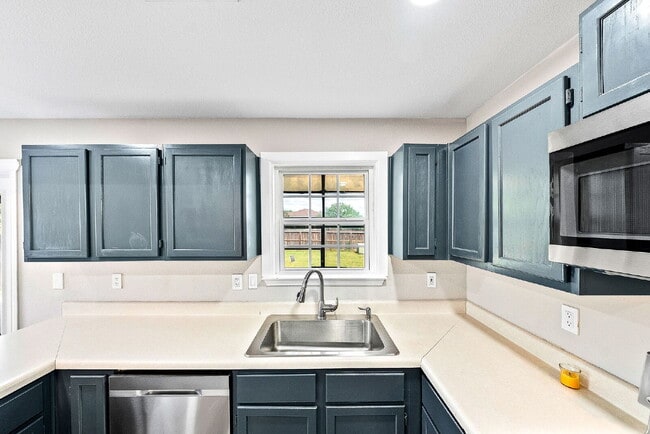 Building Photo - A Waterfall Shower, a Sunroom, and a Story Worth Coming Home To