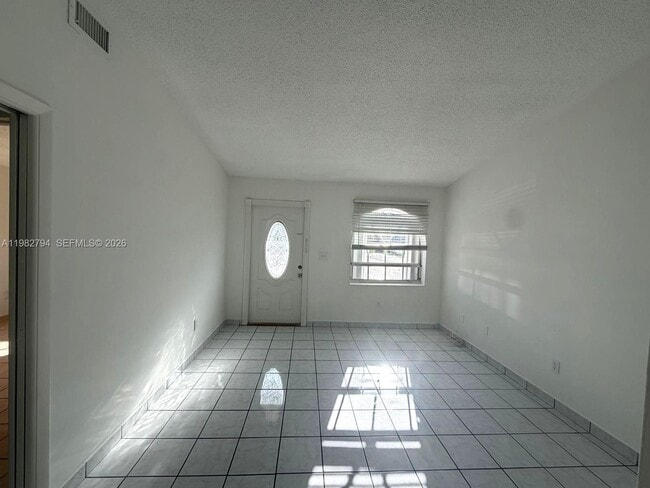 Building Photo - 5740 W 21st Ct