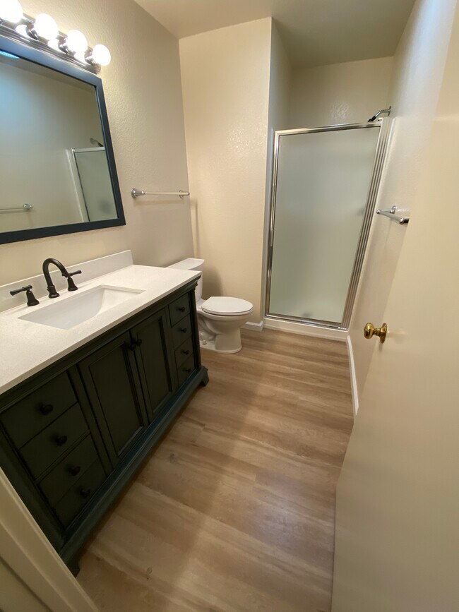 First floor bathroom with vanity, toilet and shower - 445 Willow Ave