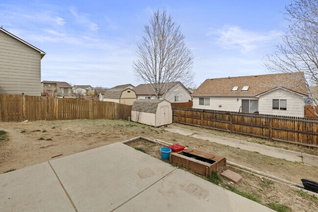 Building Photo - Spacious 4-Bedroom Home with Fenced Yard, 2-Car Garage & Scenic Views in Cheyenne Meadows