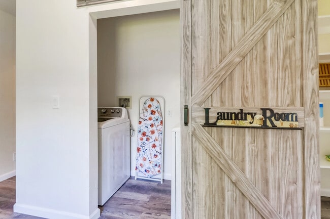 Open the sliding door & you'll find a laundry nook w/ supplies you need for your stay - 1738 Dahlia Ave
