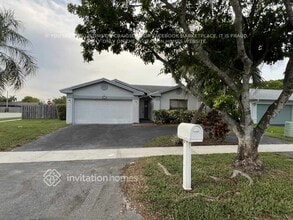 Building Photo - 9821 NW 41st Ct