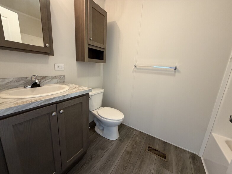 Building Photo - 15882 Villaire Ave