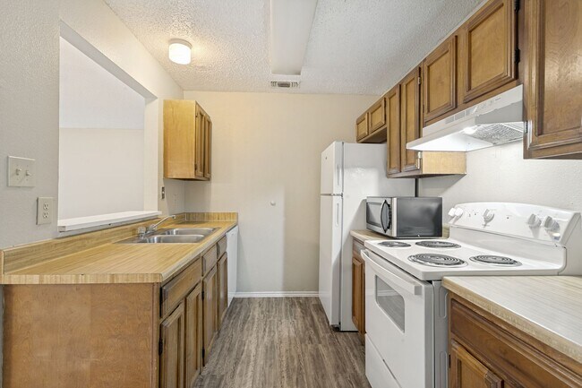 Building Photo - 2-BEDROOM DUPLEX