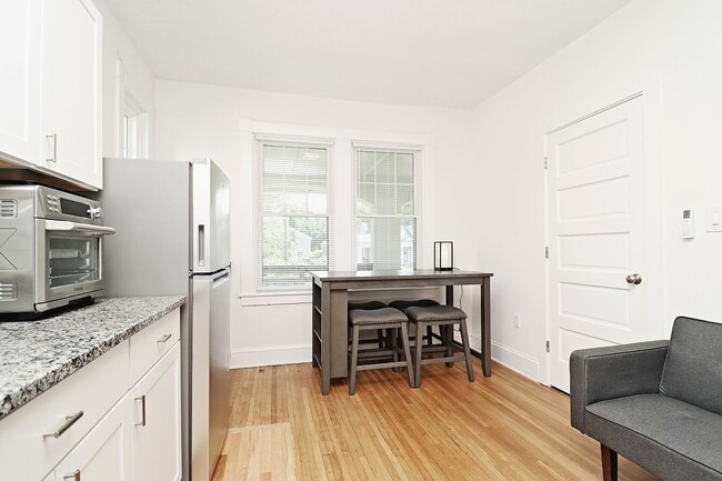 Building Photo - Furnished, Light-Filled Apartment With Utilities Included