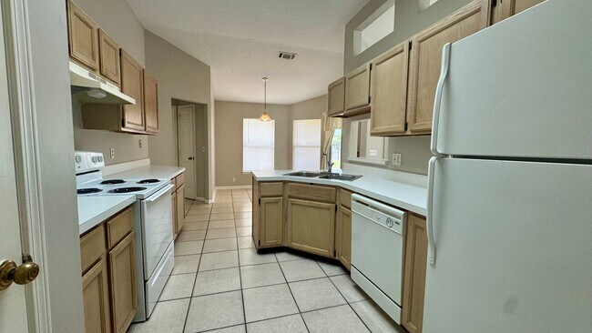 Building Photo - Bright & Spacious Home with 2 Car Attached...