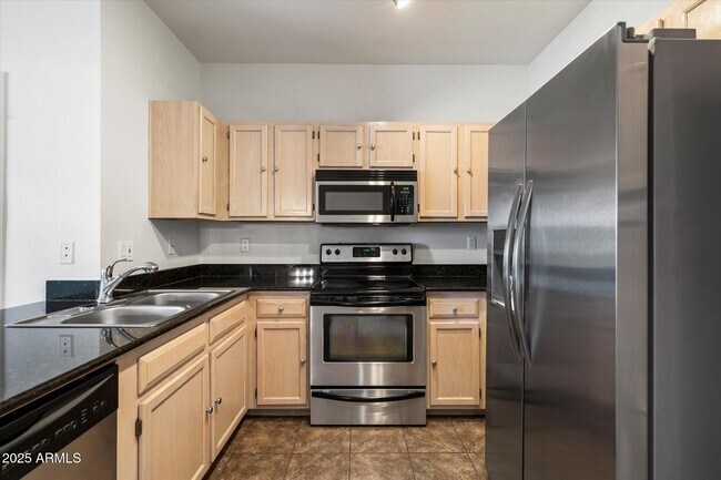 Building Photo - 7009 E Acoma Dr