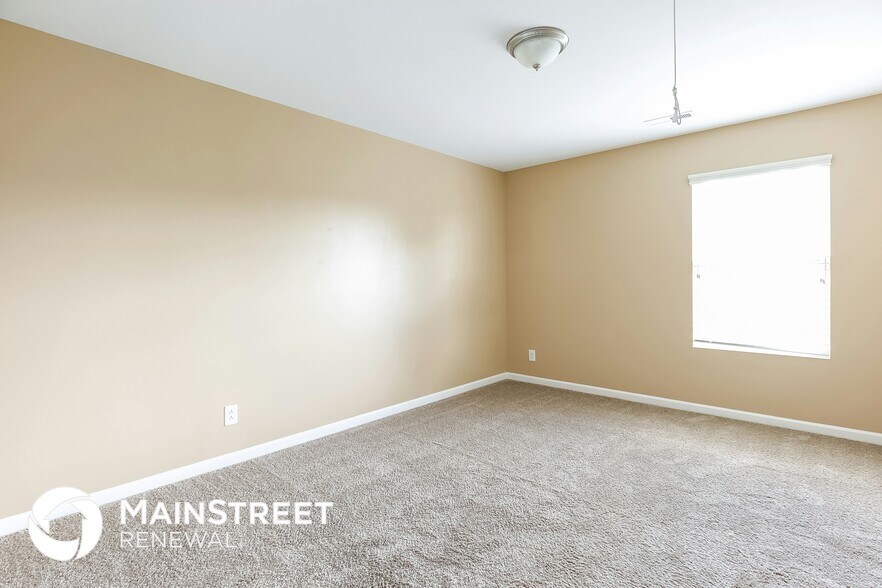 Building Photo - 6826 Championship Dr