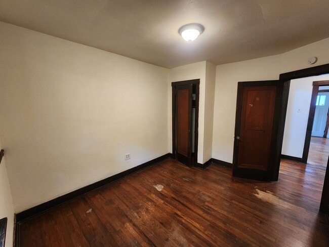 Building Photo - 4 BR home with first-floor living, new roof, and a private-feeling backyard in Lincoln Place