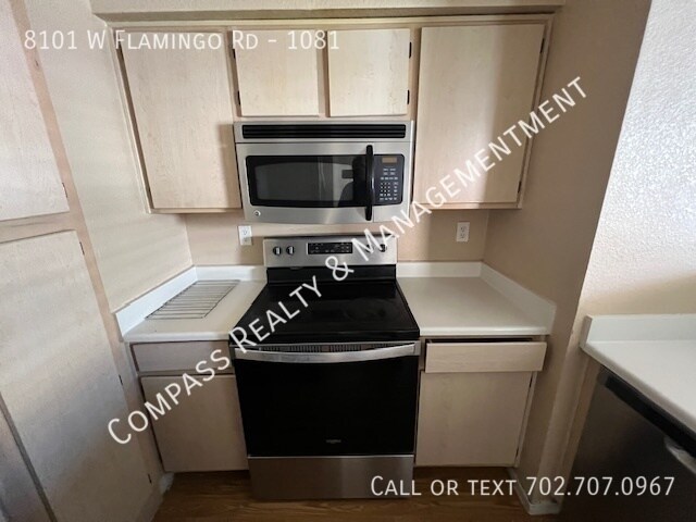 Building Photo - Welcome to your dream condo in this beauti...