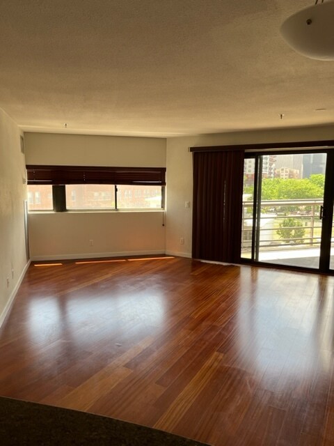 Living room and deck - 100 Park Ave W