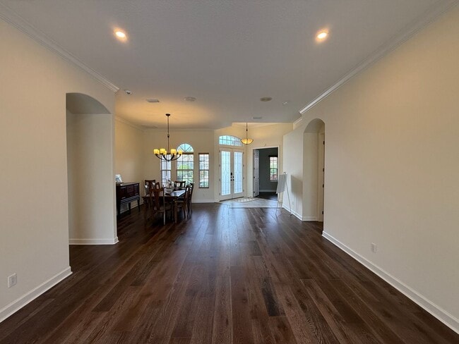 Building Photo - Luxurious 4 Bedroom 3 Bath Lakefront Pool Home W/3-Car Garage