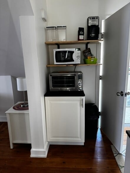 Kitchen appliances and cabinet with cooking supplies - 33 Atlantic St