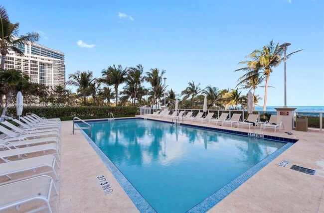 Building Photo - 10225 Collins Ave