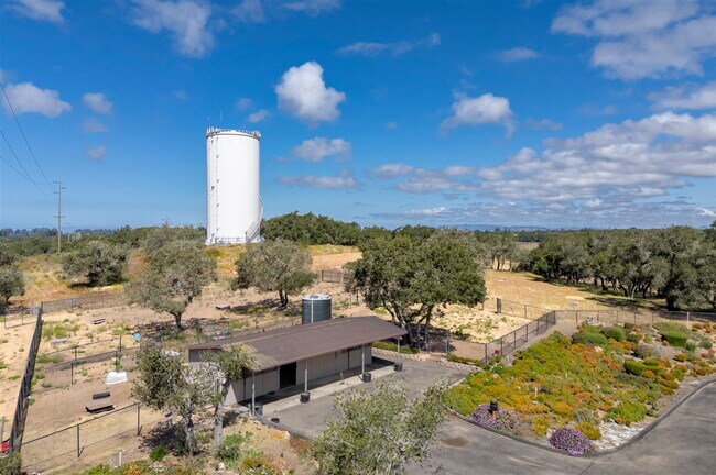 Building Photo - Private Gated Mini-Ranch • 7+ Acres • Luxury Country Living • Indoor Pool • Horses Welcome