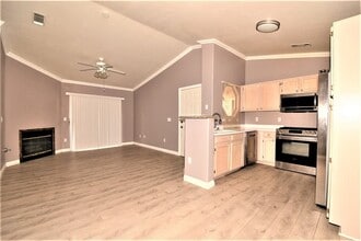Building Photo - Stunning 1 Bed 1 Bath Condo On 2nd Floor at Opulence!