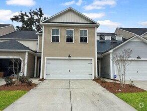 Building Photo - Pristine 2 story Townhome located in sough...