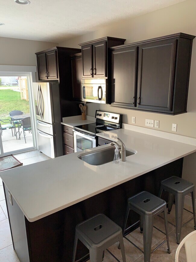 Building Photo - 161 Escanaba Ave