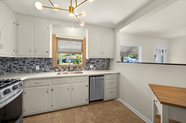 High end sink, new dishwasher and a view to the neighborhood. - 114 N Foote Ave