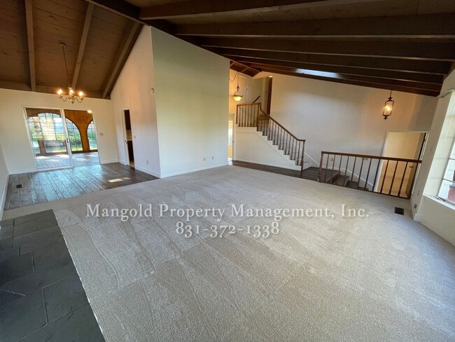 Building Photo - Beautiful 4-bed 2-bath Home with Cozy Fireplace, Front and Back Yards and Large Windows!