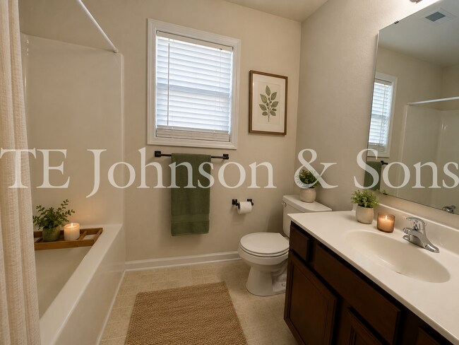 Building Photo - Spacious 3 Bedroom Home with Primary Suite on Main, Gas Fireplace & Patio in Advance!