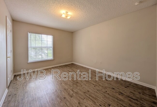 Building Photo - 8475 McGirts Village Ln
