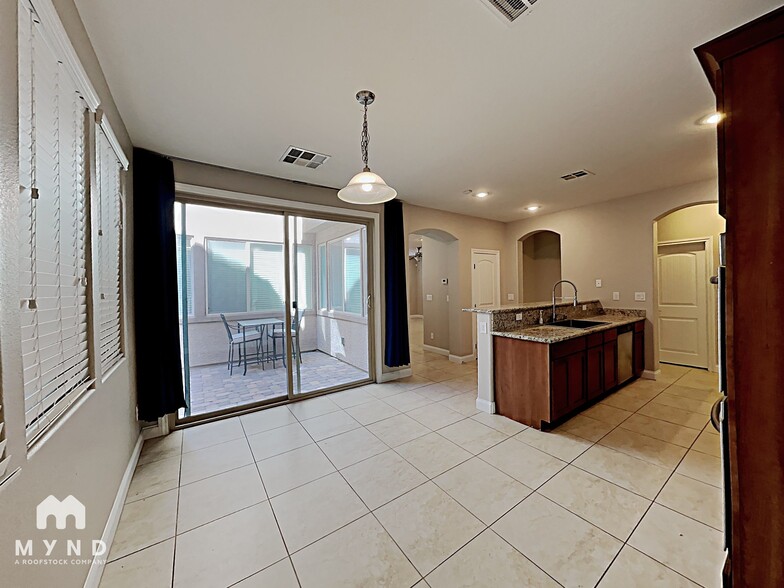 Building Photo - 6982 Castle Mountain Ave