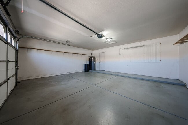 Building Photo - Welcome to this stunning 4-bedroom, 2-bath...
