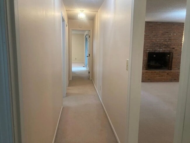 Building Photo - Beautiful Duplex Located in Serene, Wooded...