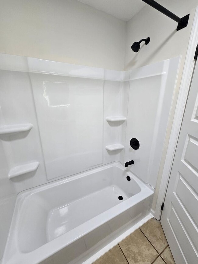 Building Photo - Renovated Home 3 bedroom 1.5 bath with new privacy wooden fence