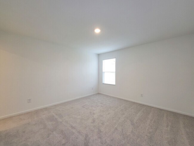 Building Photo - This lovely single-level home showcases a spacious open floorplan shared between the kitchen, din...