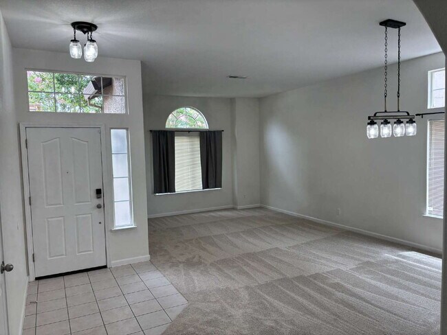 Building Photo - Spacious 4 Bed, 2 Bath Home with 3-Car Garage, Nice Backyard & Pet-Friendly Living