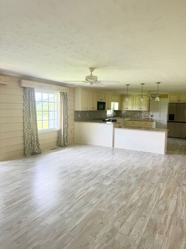 Building Photo - Hard-to-Find Home with Garage & Detached Shed & Modern Updates