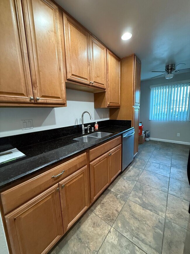 Building Photo - Excellent 2 bedroom 2 bathroom single story condo with private backyard.