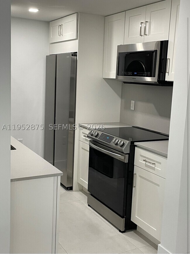 Building Photo - 10275 Collins Ave