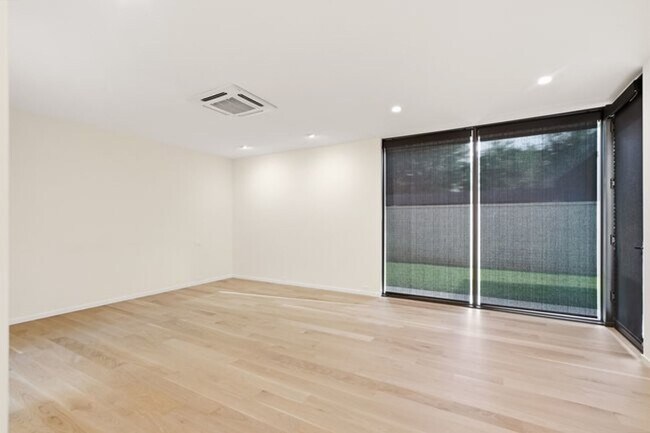Building Photo - Experience contemporary luxury in this exceptional custom-built Midtown Tulsa residence, where so...