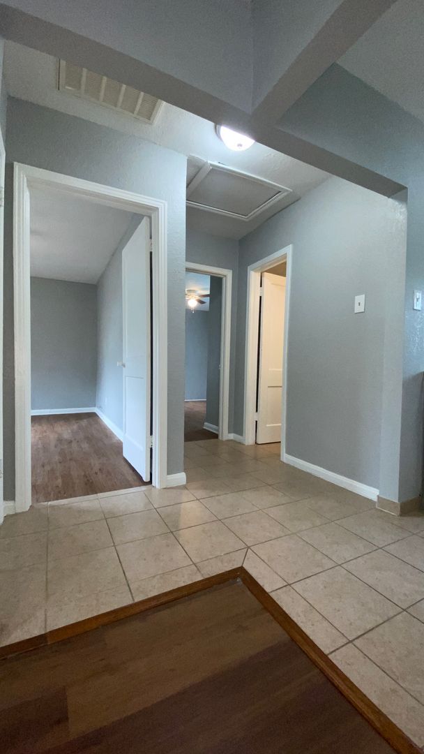 Building Photo - Freshly Painted and Ready for Immediate Move In