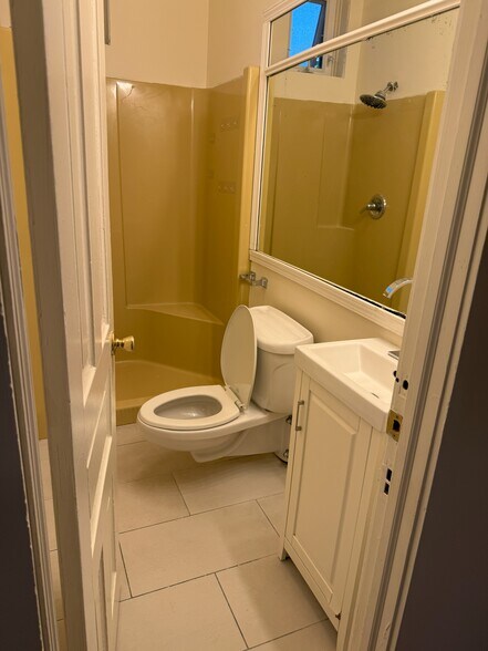 bathroom with shower - 2059 N Clifton Ave