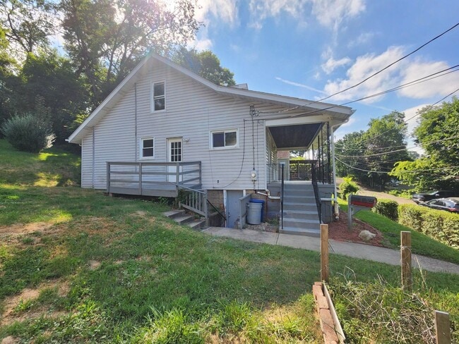 Building Photo - 4 BR home with first-floor living, new roof, and a private-feeling backyard in Lincoln Place
