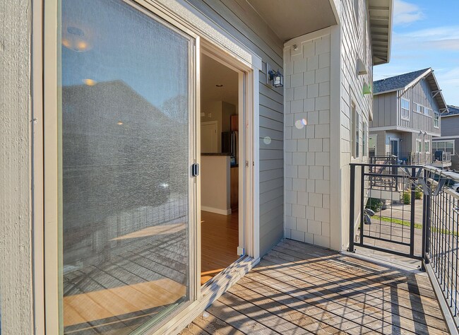 Building Photo - 2BR + 2.1BA Corner Townhome-Style Condo — Dual Primary Suites, Attached Garage & Most Utilities I...