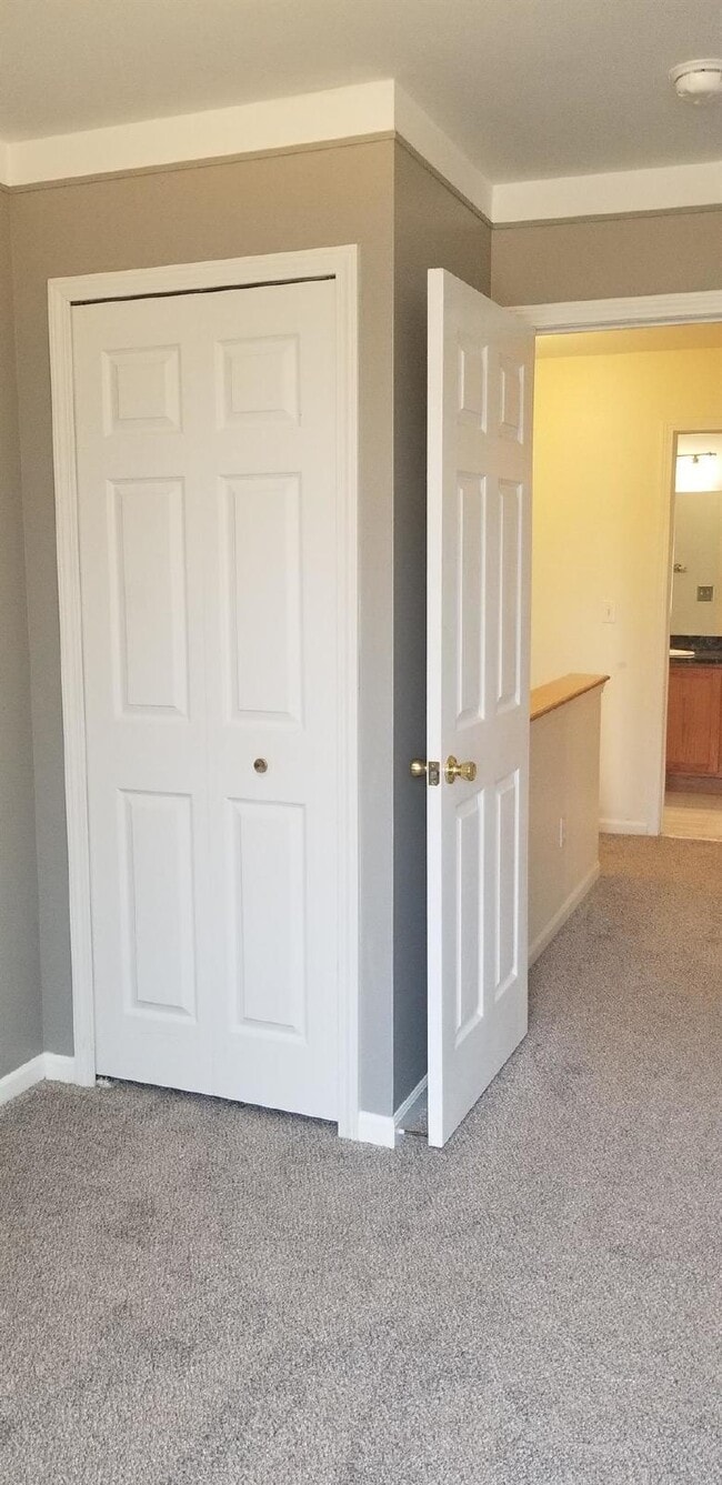 Building Photo - 2 Bedroom, 1.5 Bath Townhouse w/ Garage & Huge Master Bedroom. Full Sized Washer & Dryer In Unit.