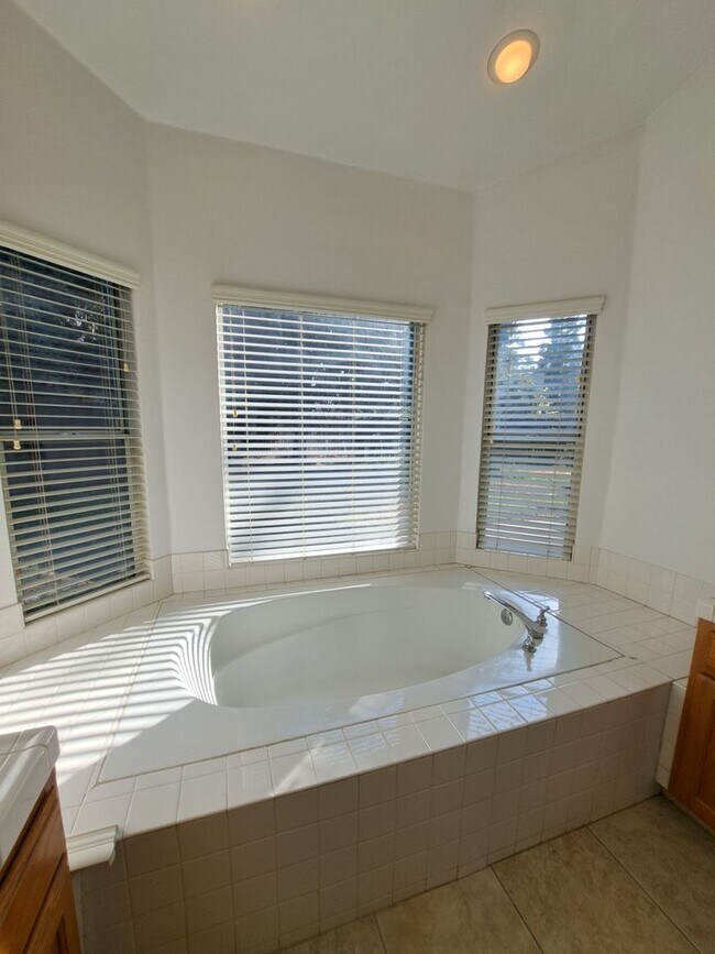 Building Photo - Move in Special: Half OFF your 1st Month's Rent! Elegant 4 Bedroom Home w/ Upstairs Loft Move in ...