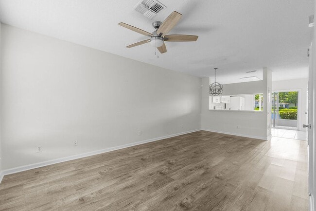 Building Photo - End Unit Water View