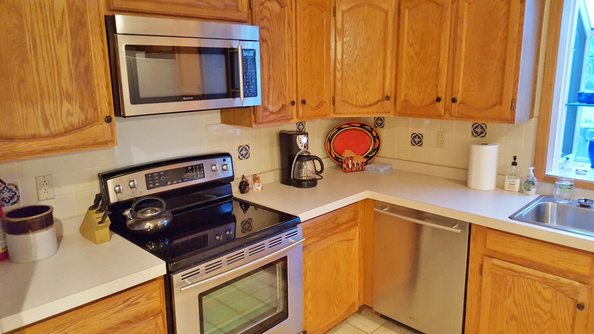 The kitchen with fairly new appliances. - 6436 Saint Josephs Ave NW