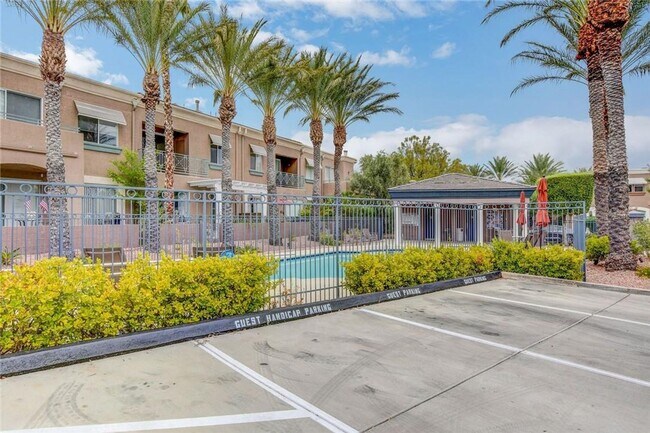 Building Photo - Amazing condominium in gated upscale neigh...