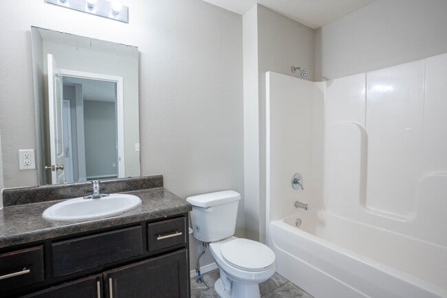 Building Photo - 3 bed home with NEW FLOORING AND FULLY FEN...