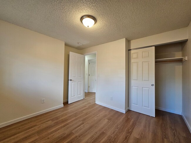 Building Photo - Charming Single-Level Home Featuring New Hardwood Floors, Bright Bedrooms & Open-Concept Living